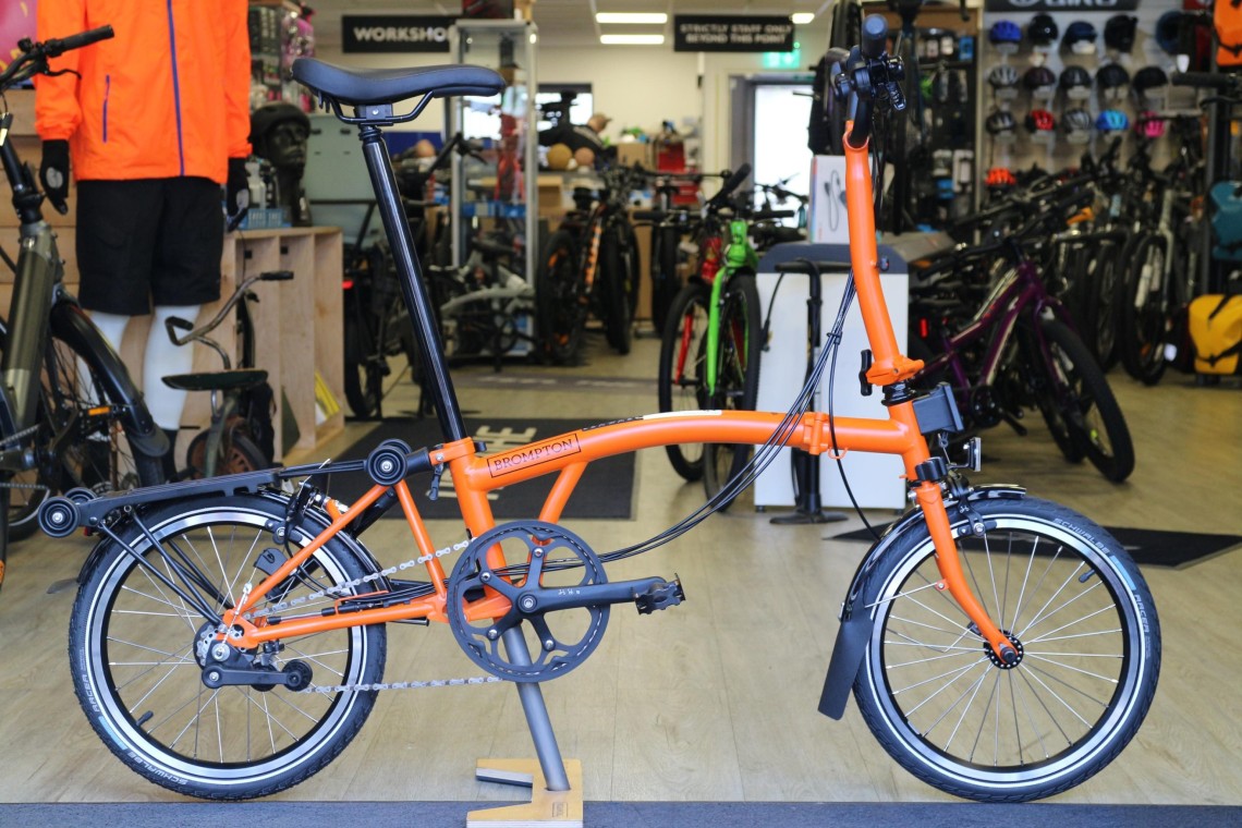 Orange brompton bike sale