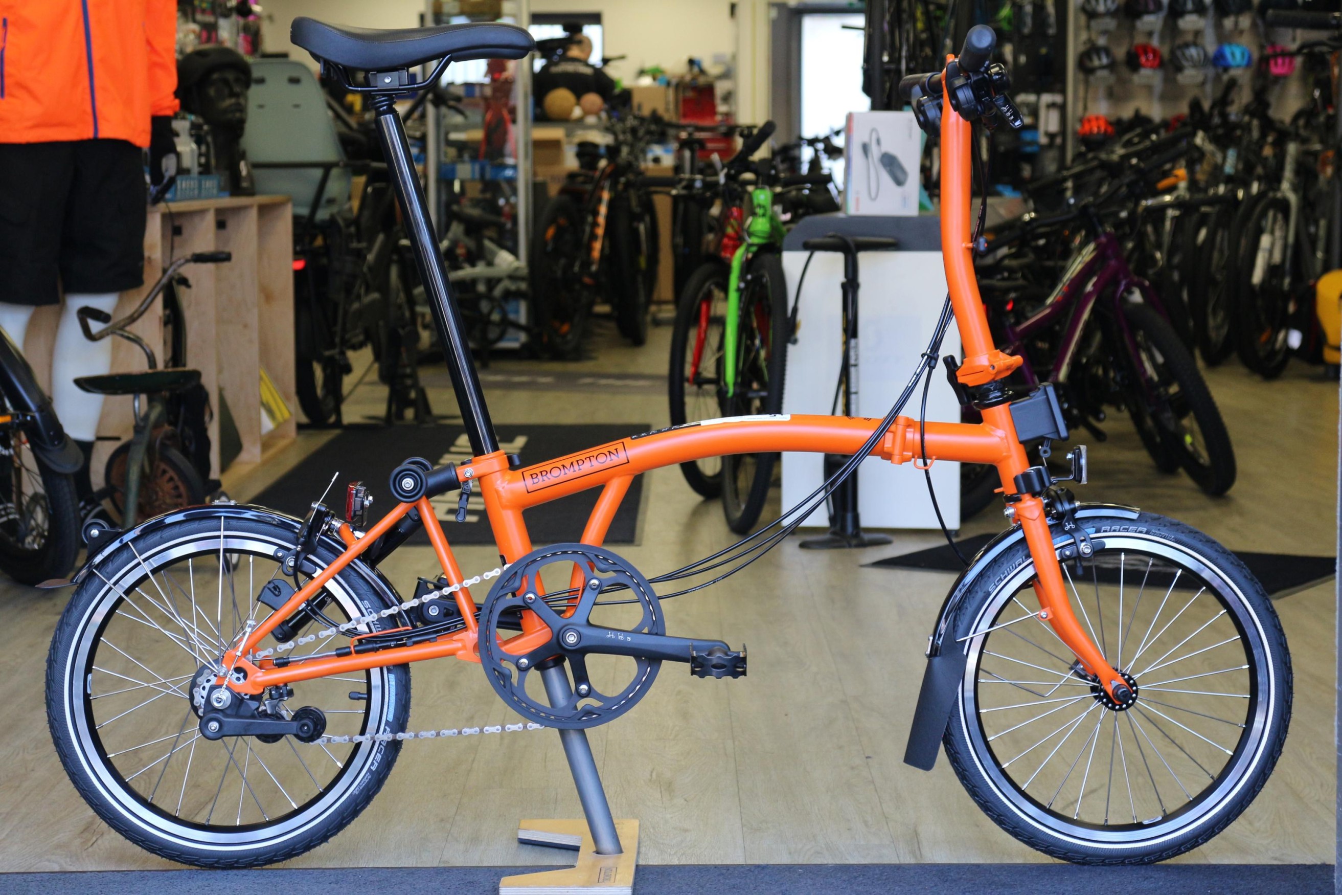 Brompton C Line Explore Low Sunset Orange 2024 Folding Bike Damian Harris Cycles E bike specialist Cardiff UK